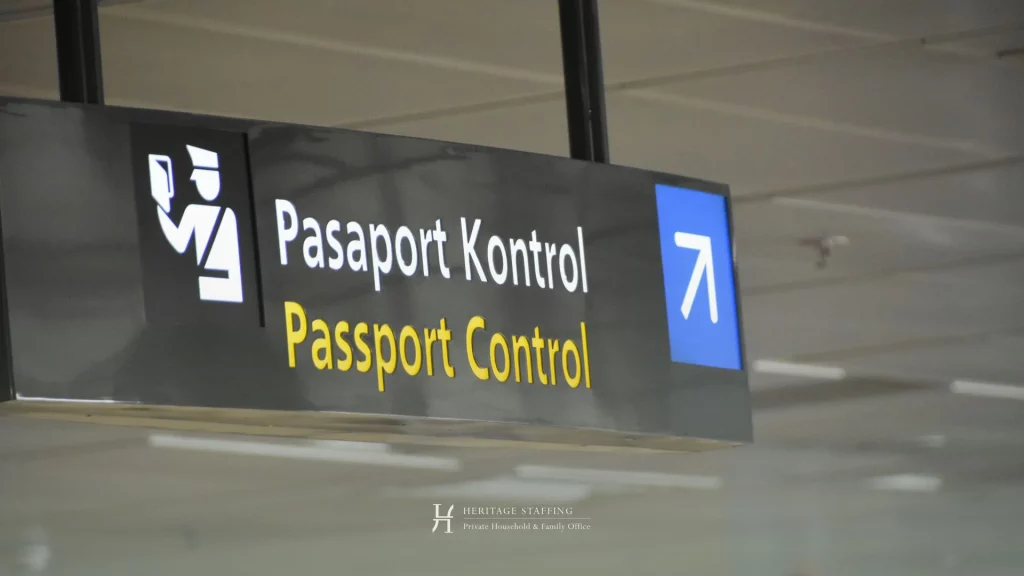 Airport passport control sign representing cross-border employment and labor compliance between Switzerland and the EU