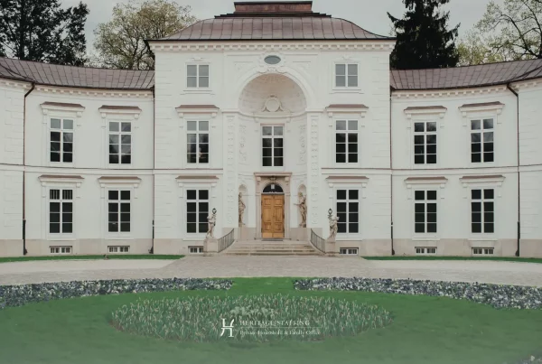 Grand estate exterior representing a multi-jurisdictional household structure with central oversight and compliance requirements.