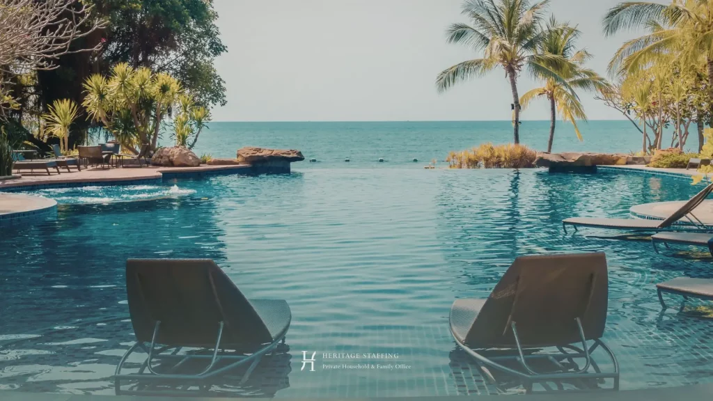 Luxury pool and beachfront property showing lack of active maintenance during seasonal closure