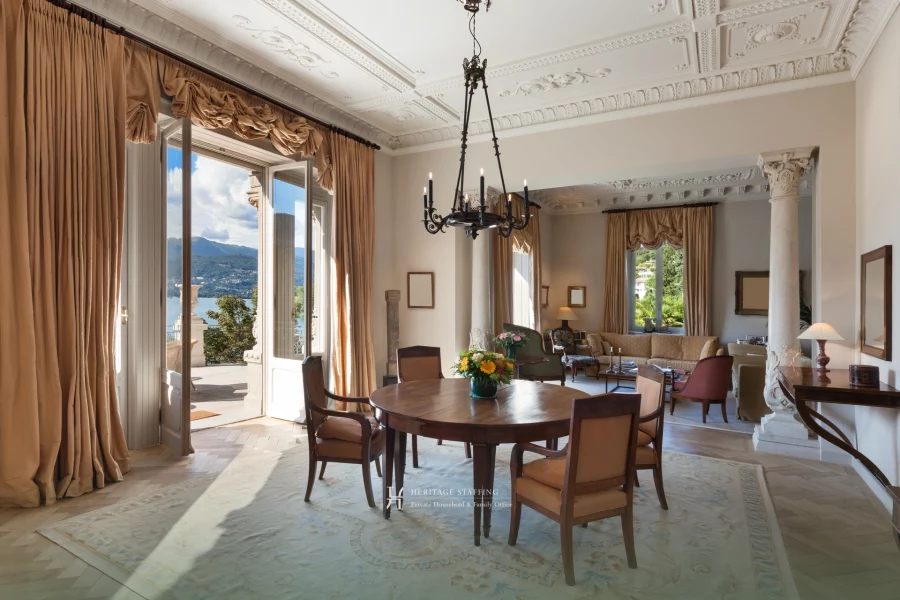 Elegant luxury living room of an international UHNW residence with lake and mountain views